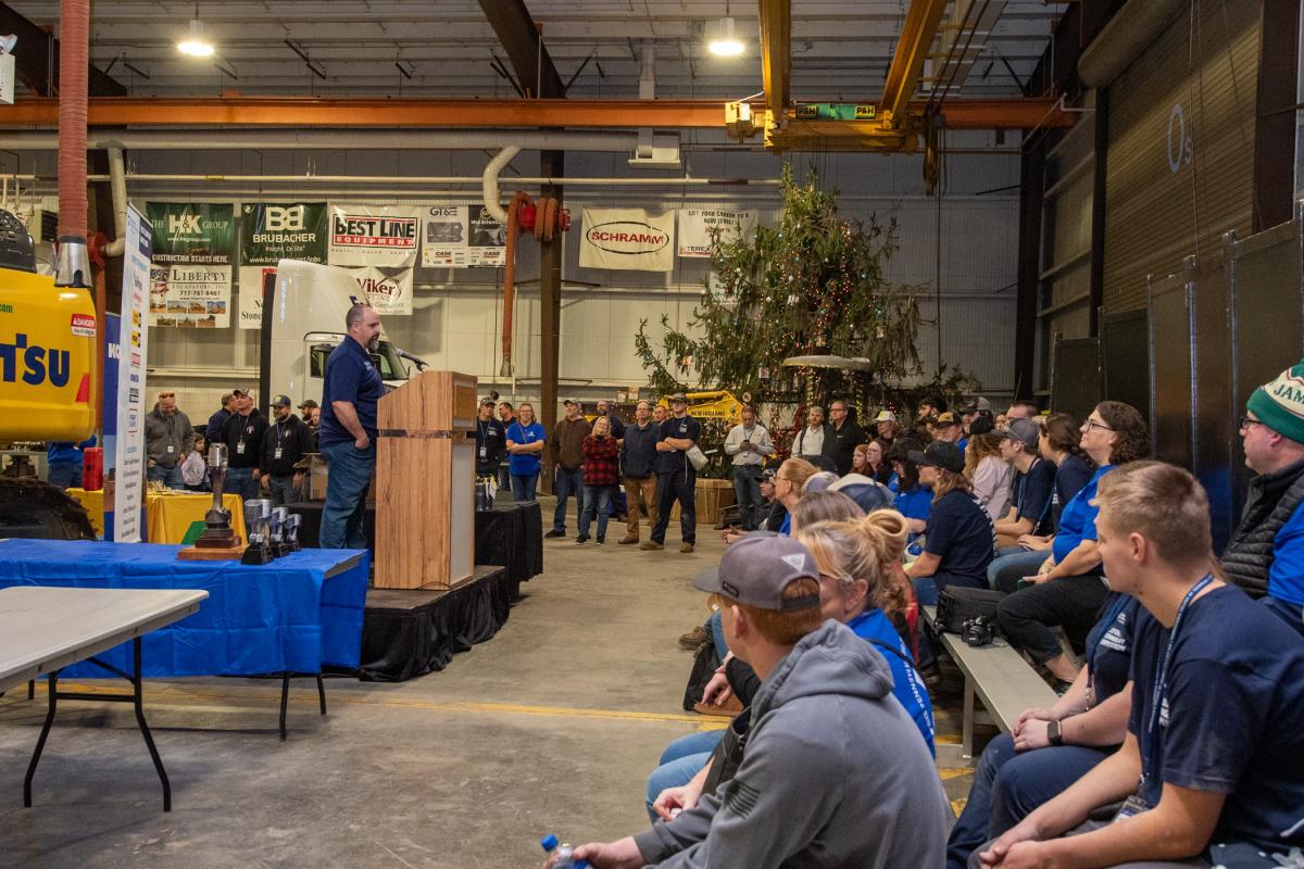 A spellbound crowd listens as Brad R. Conklin, instructor of diesel equipment technology, prepares to announce the winners.
