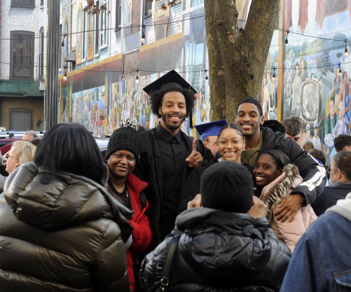 Tashad Thompson Jr., who attained his bachelor's in accounting, is engulfed in familial love.