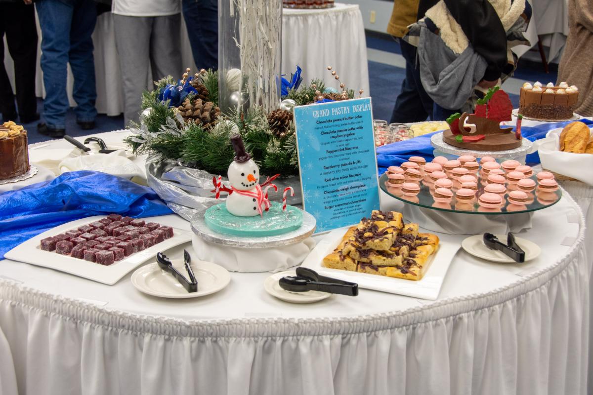 One student's contribution: chocolate peanut butter cake, chocolate panna cotta with raspberry gelee, peppermint macarons, raspberry pate de fruit, red wine onion focaccia and two showpieces (a sugar snowman and chocolate sled).