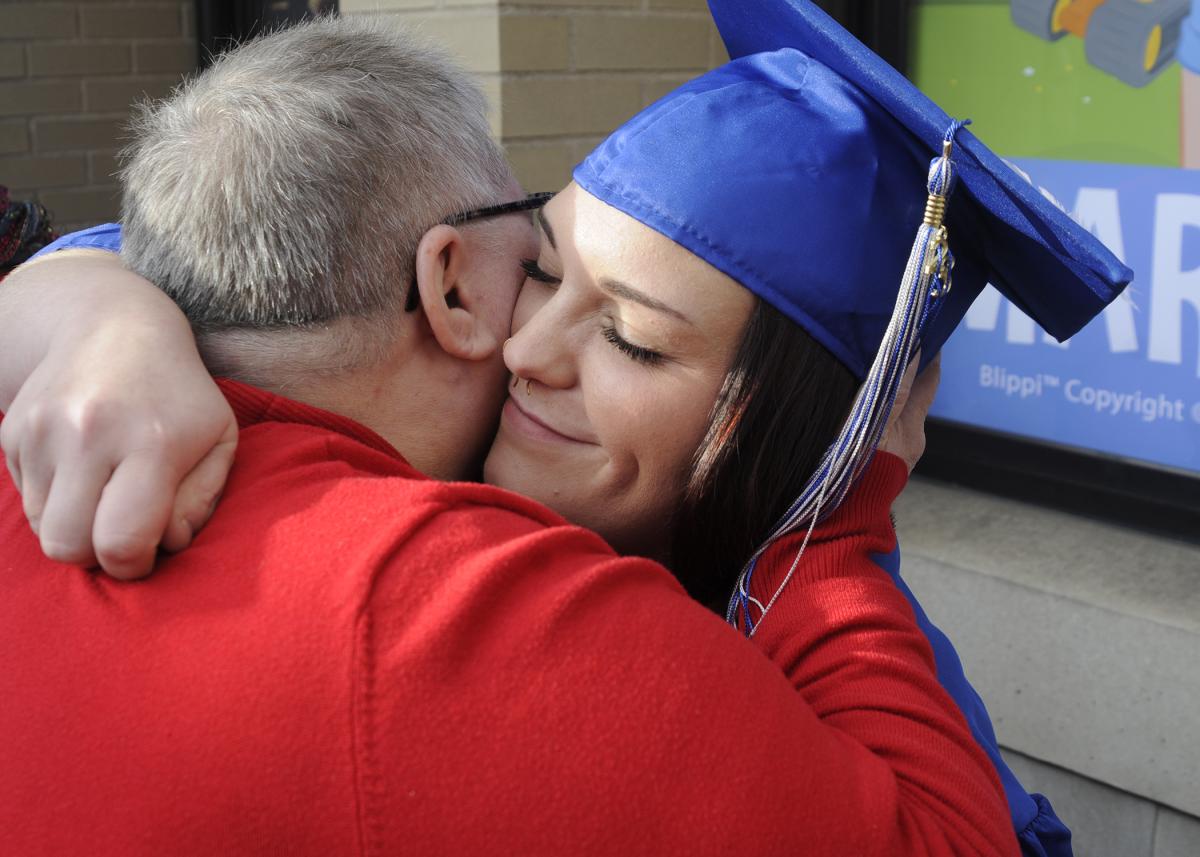 Kae A. Little, who will seamlessly move from an associate degree in human services & restorative justice to the bachelor's major in the spring, shares an oh-so-genuine moment with mother Jennie, one-half of her proud parental support team.