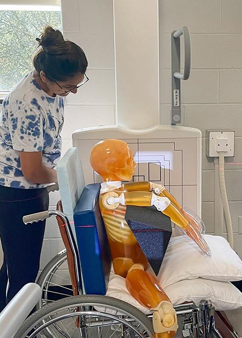 Pennsylvania College of Technology radiography student Kelin N. Patel, of Hughesville, oversees a chest X-ray on a pediatric phantom purchased through the Dr. and Mrs. Arthur William Phillips Charitable Trust. (Photo by Lisa M. Dostick, clinical supervisor of radiography)