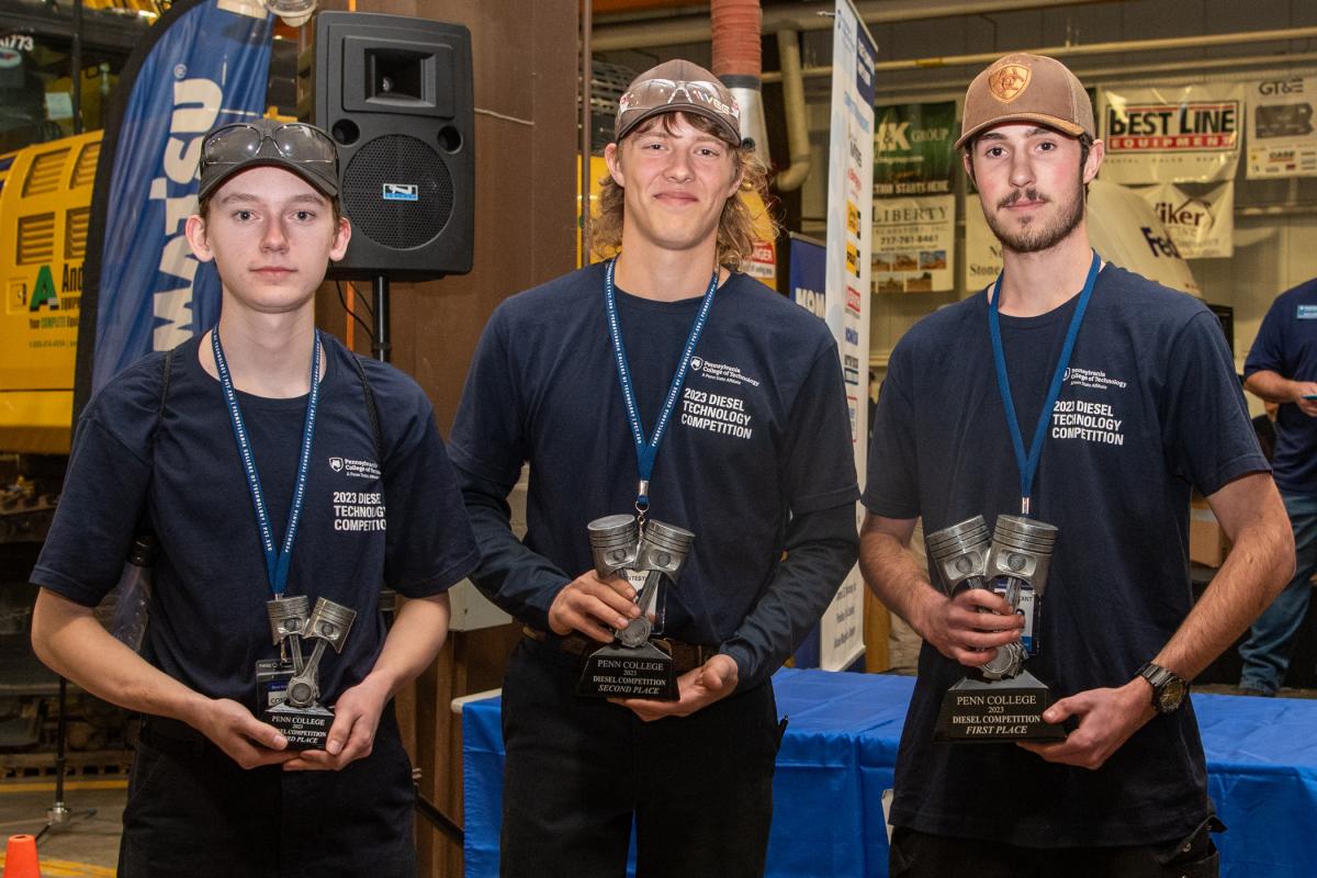 The top three individual winners in Pennsylvania College of Technology's recent diesel competition are (from left)  Cristofer J. Cote, Berks Career & Technology Center (heavy equipment), third place; Ryan D. Ciccocioppo, Cumberland Perry Area Career & Technical Center, second place; and Evan Bauer, Bucks County Technical High School, first place. 