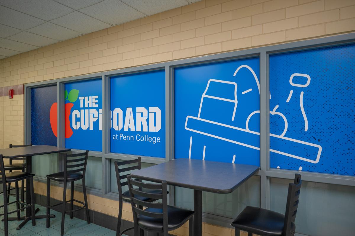 Wall graphic outside The Cupboard