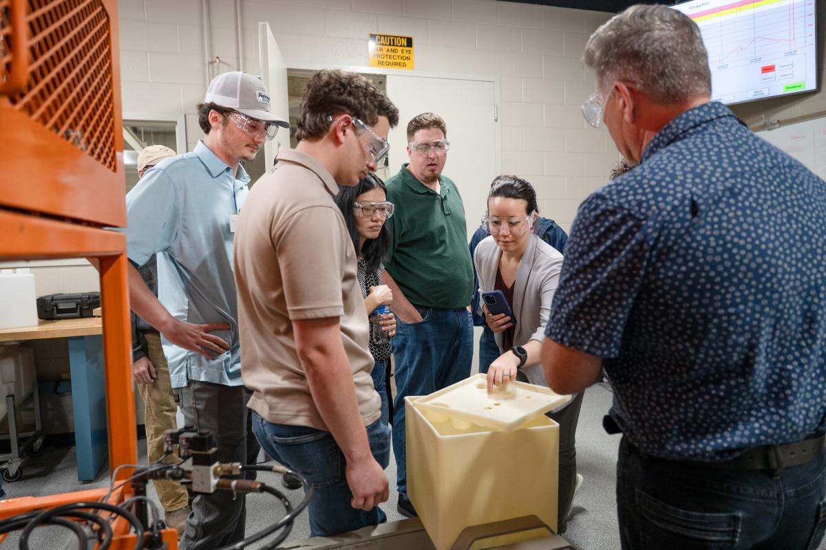Participants of last year's Rotational & Advanced Materials Workshop explore multi-layer molding for dual-layer polyethylene foam. 