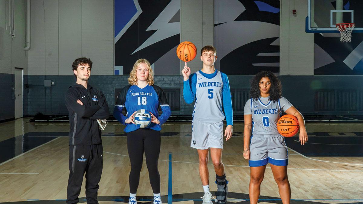 Student-athletes gather on their updated home court inside Lewis H. Bardo Gymnasium.