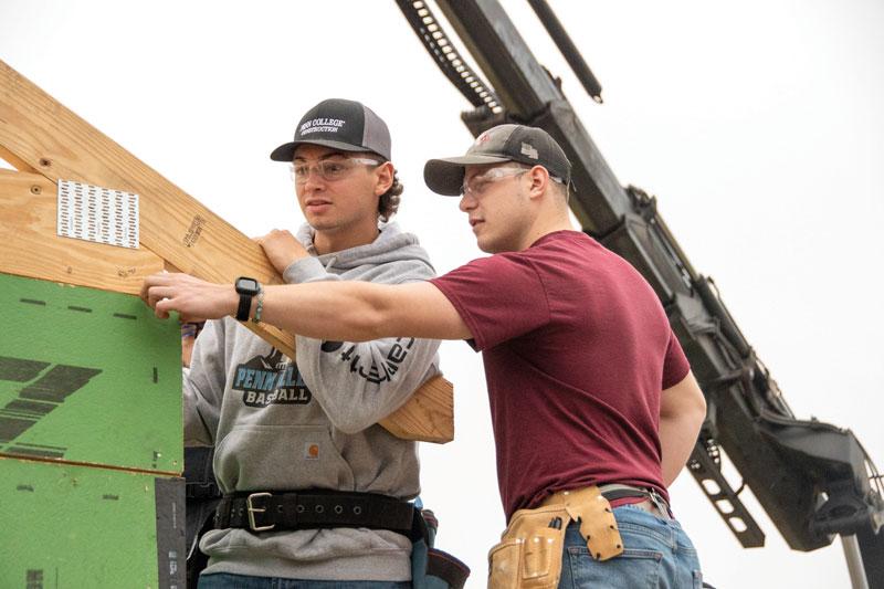 Students in construction-related majors building a Habitat for Humanity house