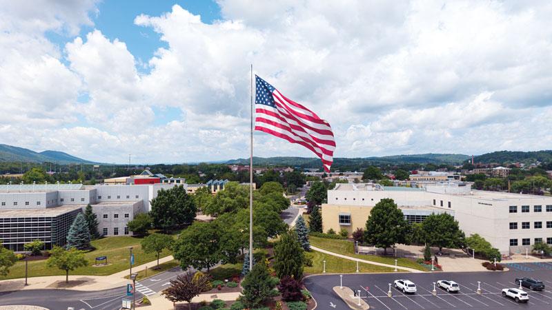 An 1,800-square-foot flag at Penn College’s main entrance was first unfurled in November 2000.