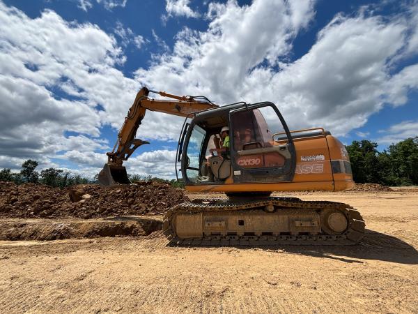 Student operating heavy equipment