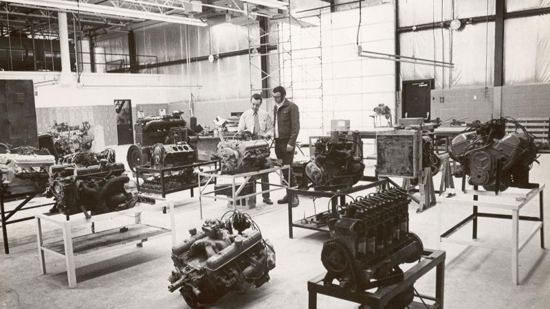 circa 1980: Instructor Joseph Sick, left, with a student in the diesel engine lab.
