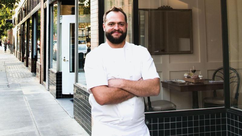 Chef Dean Yasharian ’03 at Perle, the Pasadena, Calif., restaurant he opened during the pandemic. Despite opening at the “worst time ever,” the 50-seat bistro has gained acclaim, including a Michelin Plate and a place in the Los Angeles Times “101 Best Restaurants in L.A.” list.