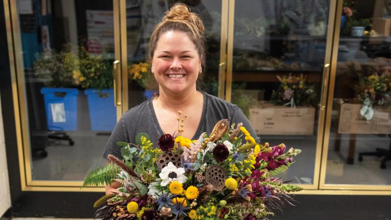 Smiling through her pre-wedding to-do list, Elizabeth M. Getchen ’07, ’09 makes a sentimental return to the Earth Science Center to arrange her wedding flowers.