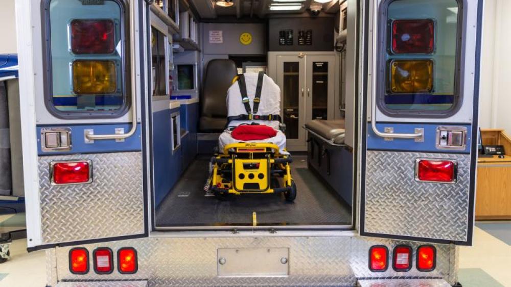 View of an empty gurney inside a mock ambulance
