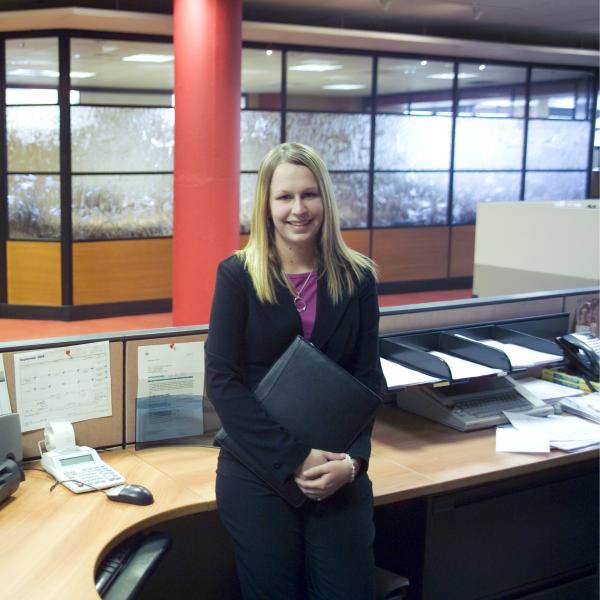 An accounting student completes day‑to‑day work during a professional internship experience.