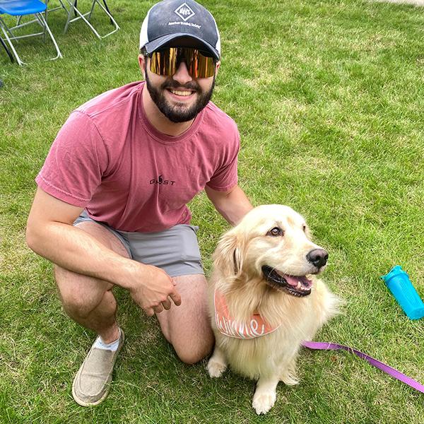 Drew R. Potts, assistant professor of civil engineering technology, again brought his endearingly cuddlesome golden retrievers Winnie – shown here with Patrick C. Evanko, a welding & fabrication engineering technology student from Columbus, N.J. – and Indy. 