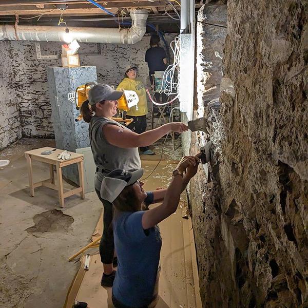 Waterproofing basement walls are (from foreground to rear) Snyder, Empet, Alexander and Marino.