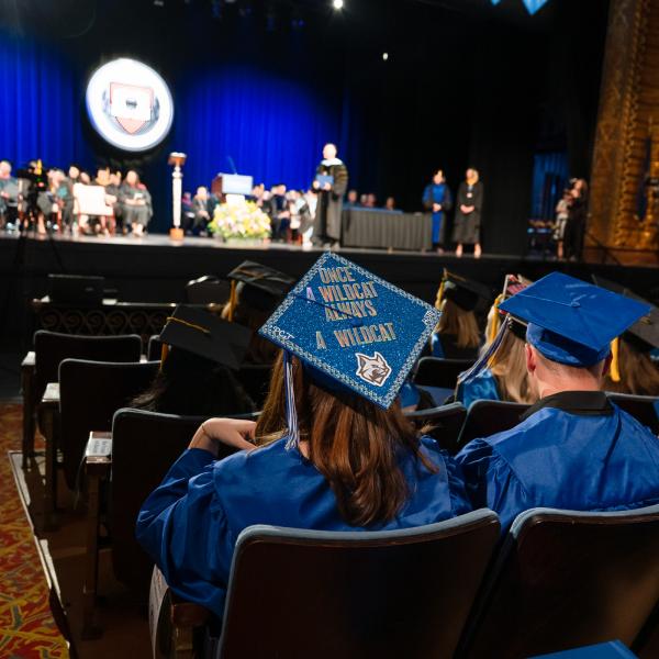 A graduation cap reads "Once a Wilcat, always a Wildcat."