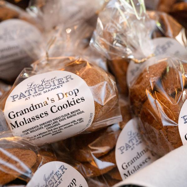 Cookies packed in cellophane bags with labels.