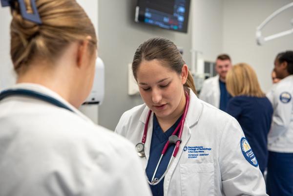 Physician Assistant students work in the lab.