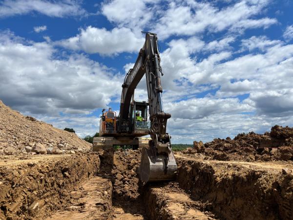 Student operating heavy equipment