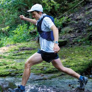Reagan McCoy '20 strides across a stream during the Eastern States 100. The 100-mile trail race features 20,000 feet of elevation gain. [Photo by Kevin Peragine Photography]