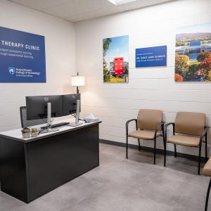 A desk and chairs in the waiting area of the new Physical Therapy Clinic 