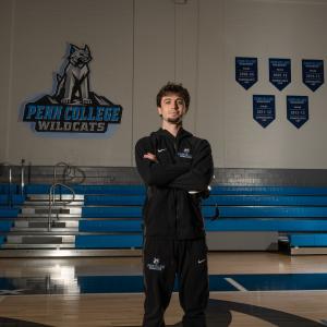Kaden Ware stands in Penn College's Bardo Gym.