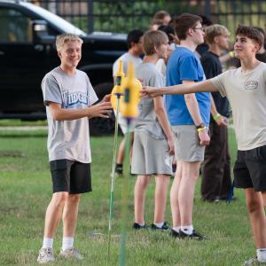 Students play a yard game on a Penn College Lawn.