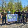 group of students with Tree Campus banner