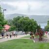 Open House guests walk across the campus mall.