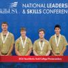 Students wearing gold medals