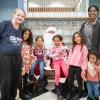 A family gathers with Santa in Penn College's Penn's Inn.