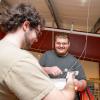 Two students work on an electrical project. 