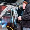 Drew P. Rupp a Penn College welding & fabrication engineering technology student, uses the PerformArc 350S robotic welding system.