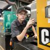 Student CJ Cote at a CAT diesel generator