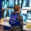 A youngster eyes a possible future in medical imaging at a display hosted by Penn College’s radiography major.