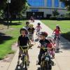 Learning Center Children Enjoy Summery 'Bike Day'