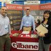 Construction management student Tamara D. Altom, of Williamsport, visits the Gilbane Building Co. table. Representing the Baltimore-based company are Ryan P. Becker (left) and Kyle J. Williams, both alumni of the college's School of Construction & Design Technologies.