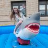 Colleen E. Bowes, of Wayne, tames the mechanical shark.