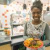 Nursing student Serecia S. Durson, of Beaver Meadows, prepares to enjoy the evening's cuisine.