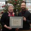 Penn College President Davie Jane Gilmour presented the Alumni Humanitarian Award to Jason C. Gross, ’05, plastics and polymer engineering technology, at winter commencement exercises held Dec. 19. 