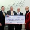 Representatives of First National Bank present a $10,000 gift that will support two innovative educational programs offered by Penn College for high school students. From left are FNB’s Don Breon, assistant vice president/treasury management; Dan Hooper, market manager/vice president; and Peter Bower, team leader/vice president; with Elizabeth A. Biddle, the college’s director of corporate relations.