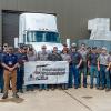 Mark E. Sones, instructor of diesel equipment technology (far left), and Greg Moser, district fleet manager for FedEx Freight and a 1999 alumnus (fourth from left), join with diesel students to commemorate FedEx Freight’s donation of a 2014 Kenworth T680 semi-trailer truck to Pennsylvania College of Technology to facilitate hands-on learning.