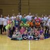 Penn College student-athletes (in white shirts) gather with the elementary-aged girls they championed in Saturday's daylong clinic.