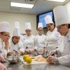 Pennsylvania College of Technology’s Chef Mary G. Trometter, assistant professor of hospitality management/culinary arts, leads first-year students culinary and baking and pastry arts students in one of the college’s well-equipped labs.