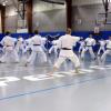 Students Promoted After Martial Arts Exam on Campus